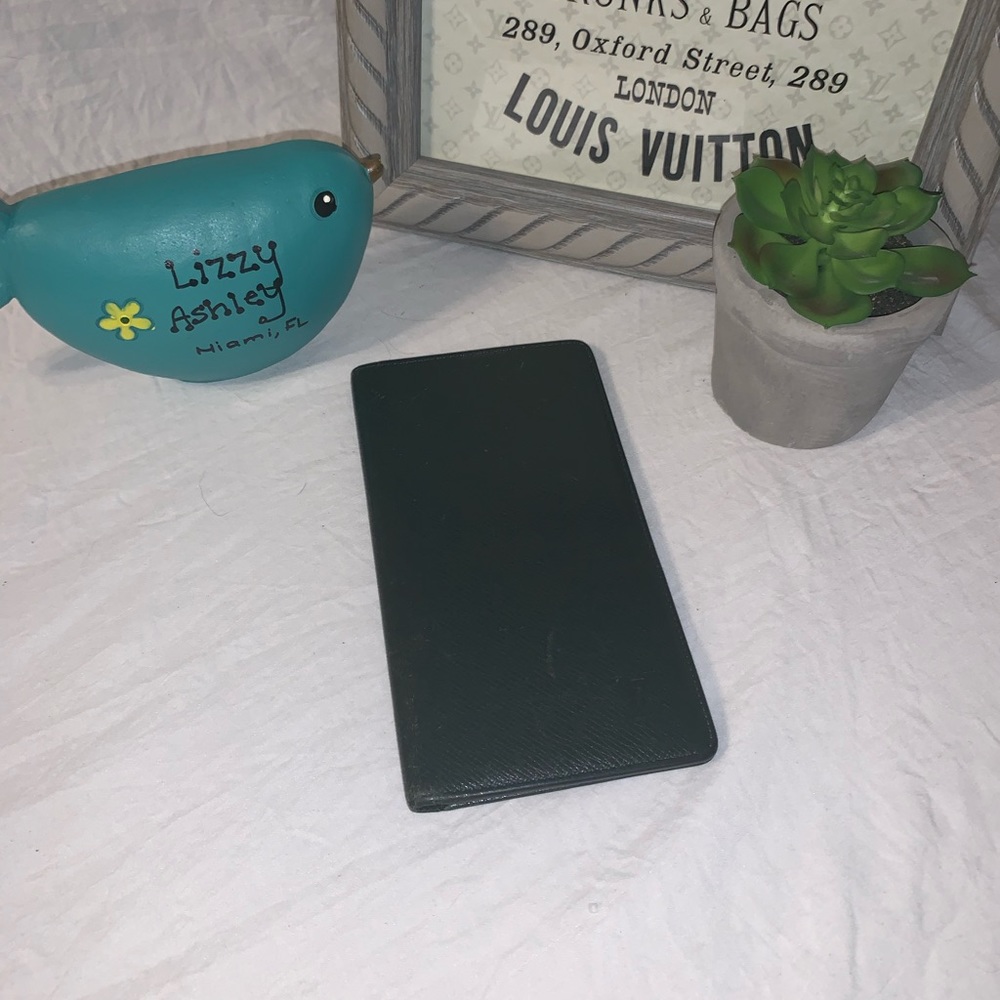 Louis Vuitton Taiga leather checkbook cover/wallet